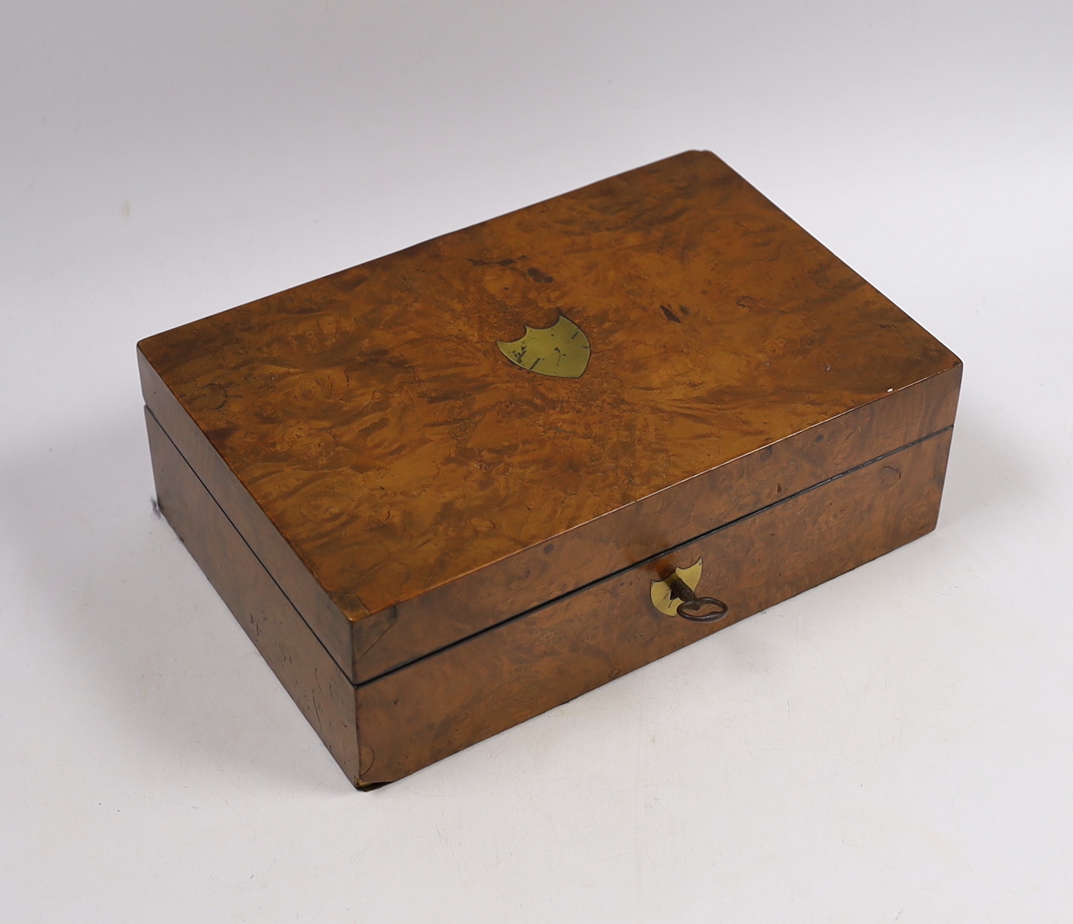 An early 19th century French bird's-eye maple and a walnut sewing box containing some sewing accessories, 24 x 16 x 8cm